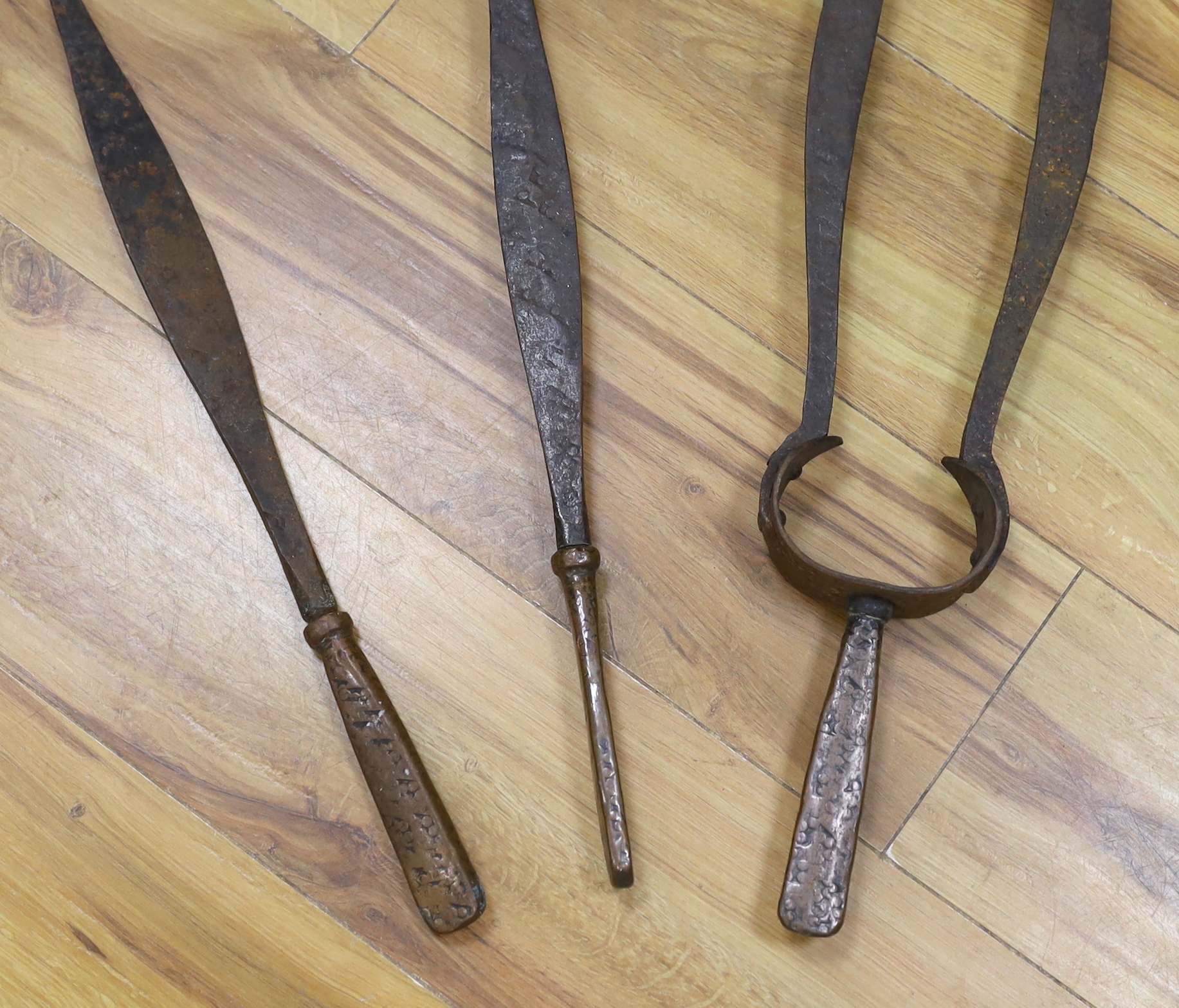 A set of Arts & Crafts fire irons